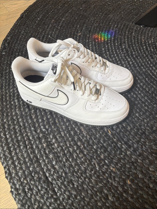 Nike Other - Nike White Low-Top Leather Sneakers with Black Swoosh